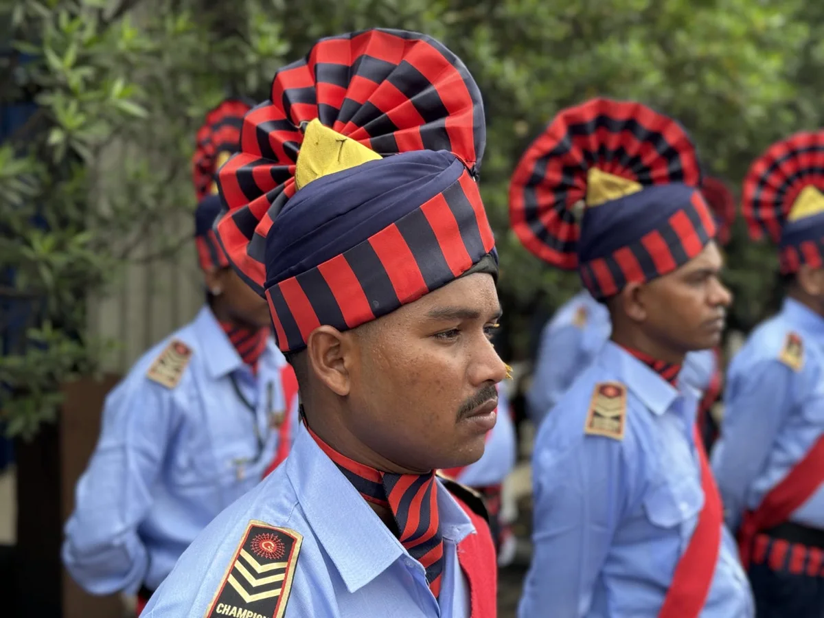 Uniformed security personnel standing in disciplined formation