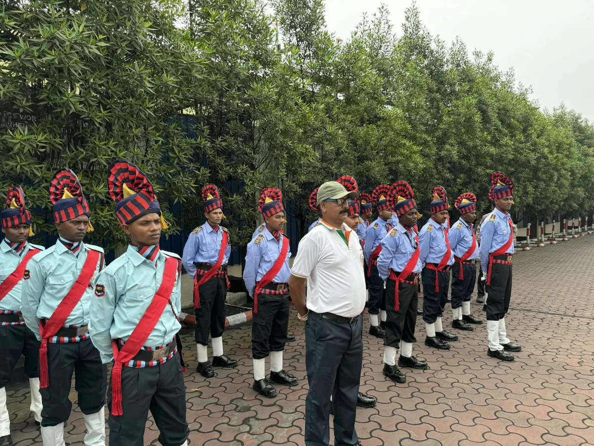 Supervisor inspecting a line of uniformed security personnel